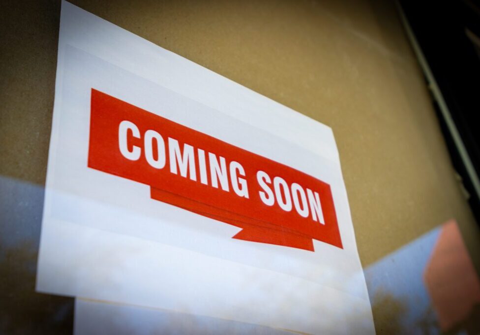 Red "Coming Soon" paper sign